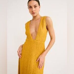 Savannah Morrow Altyn mini dress in the color Sunshine.